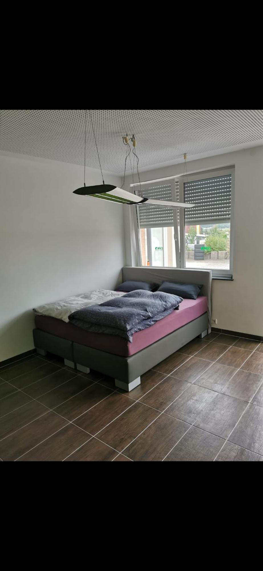 Appartement Zimmer Zum Uebernachten à Münsingen Extérieur photo